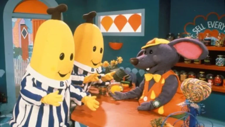 Bananín y Bananón en escena animada con fondo colorido y estilo infantil noventero